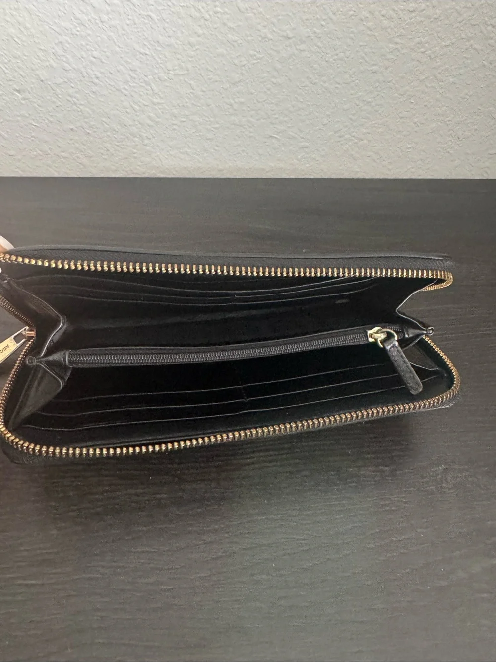 Michael Kors Monogram Zip Wallet in Tan and Black with Gold Plaqueu
